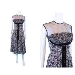 Vintage 50s Black Floral Cocktail Dress Printed Sheer Neckline Velvet Bow W 24"